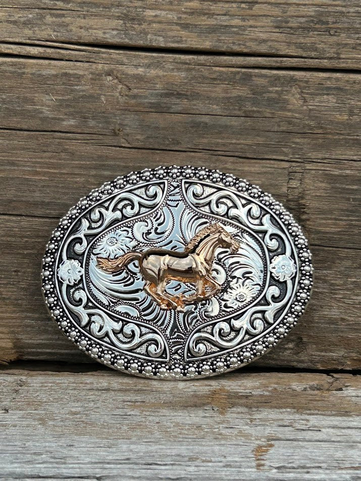 Intricate designed Silver oval belt buckle with a Gold horse running in the middle. Front View