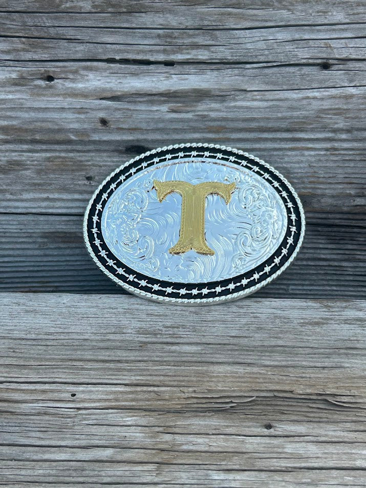 Matte Black and Silver oval shaped belt buckle with Gold initial. Initial T