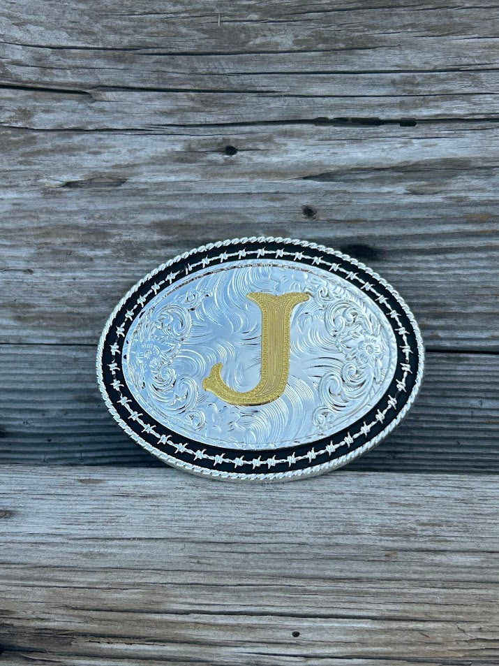 Matte Black and Silver oval shaped belt buckle with Gold initial. Initial J