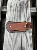 Praying Cowboy design knife sheath with keep in Brown. Rear view showing belt loop. 