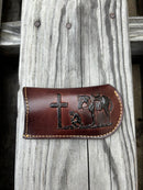 This Coffee Brown leather knife sheath from Top Notch Accessories features a embossed praying cowboy design. Front View