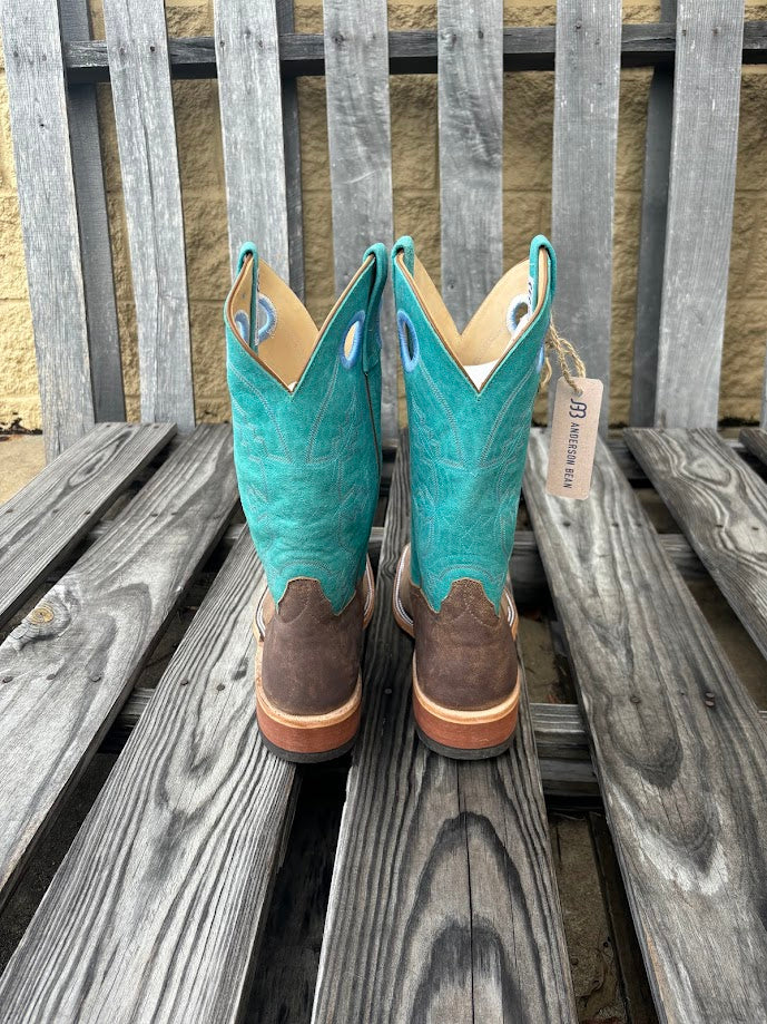 Anderson Bean men's western boots with Eastwood camel vamp and turquoise top, featuring a square toe and white double row stitch. Rear view
