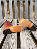 Men's Anderson Bean cowboy boots in Wheatbuck Waxy Kudu skin with a 12" Sangria Kidskin tops. Bottom view showing a tan hybrid outsole. 