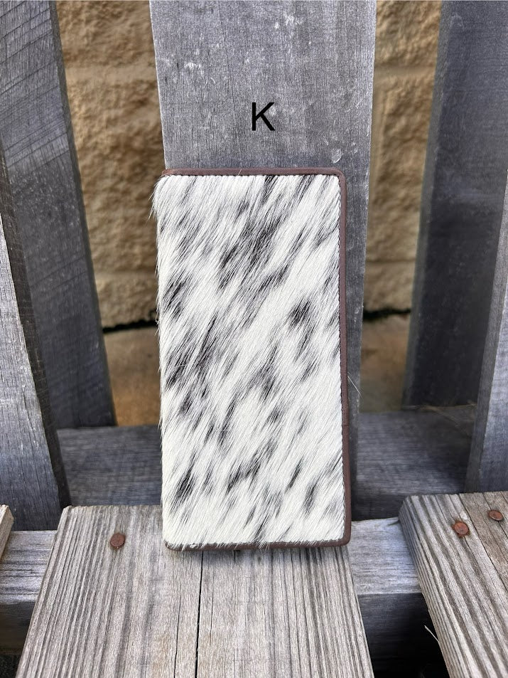 This cowhide leather tall wallet from Top Notch Accessories features 12 card slots and two bill pockets. Front View K