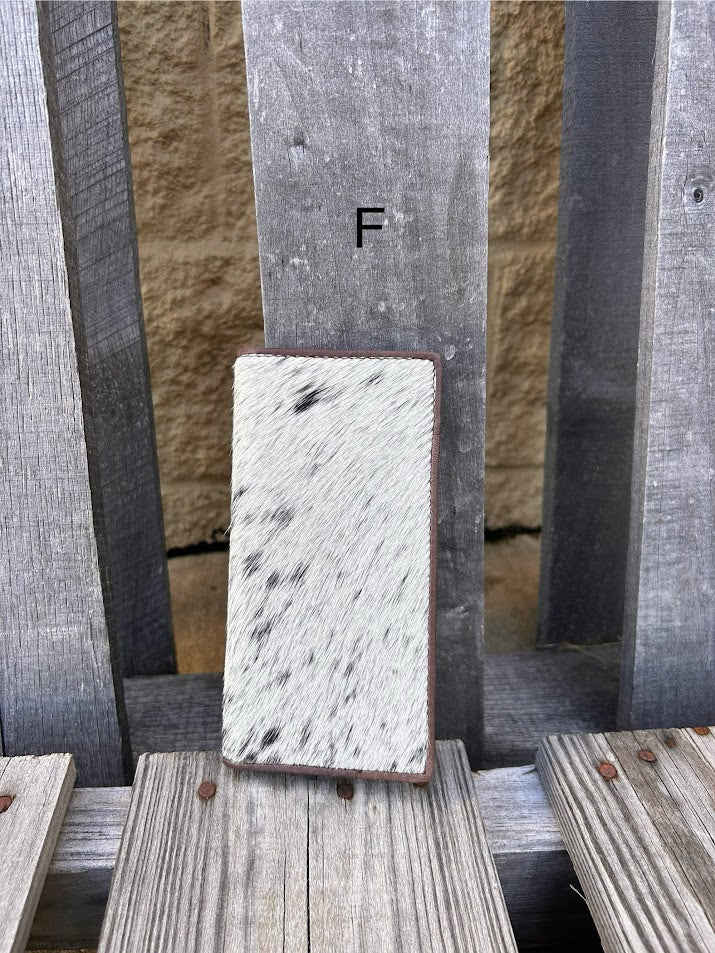 This cowhide leather tall wallet from Top Notch Accessories features 12 card slots and two bill pockets. Front View F