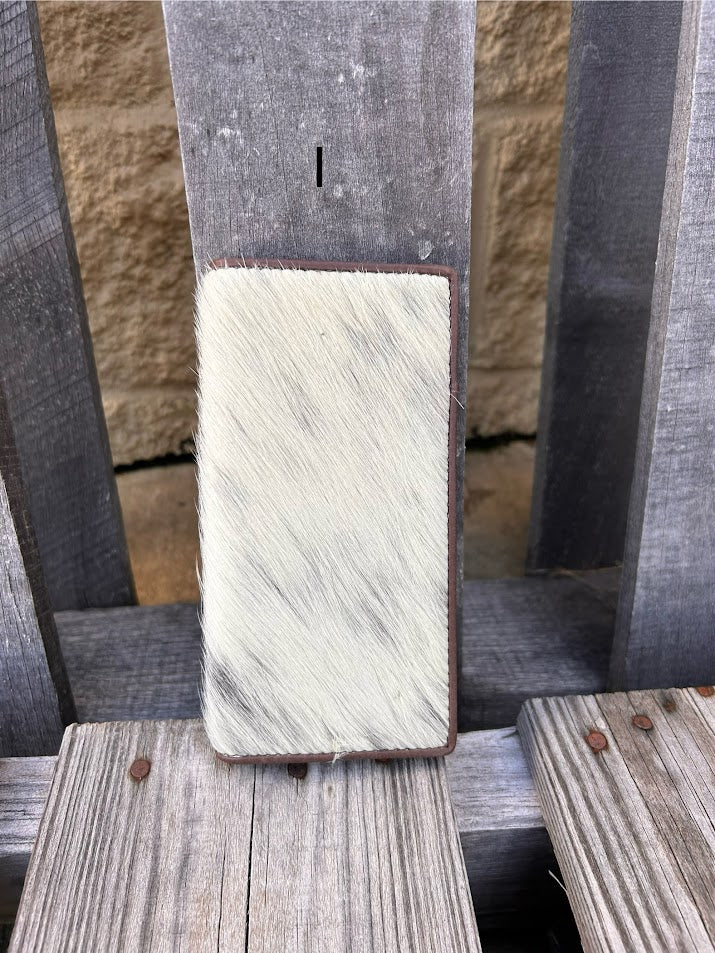 This cowhide leather tall wallet from Top Notch Accessories features 12 card slots and two bill pockets. Front View I