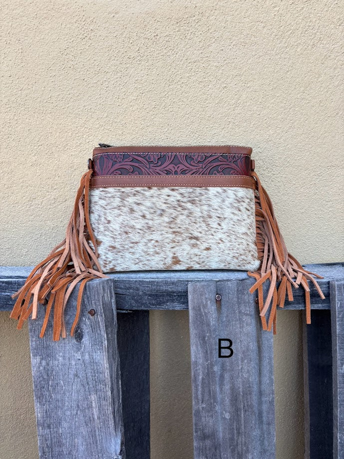 Brown leather and cowhide crossbody bag with side fringe. Front View B