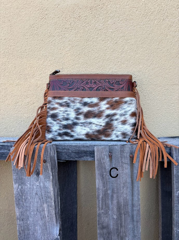 Brown leather and cowhide crossbody bag with side fringe. Front View C