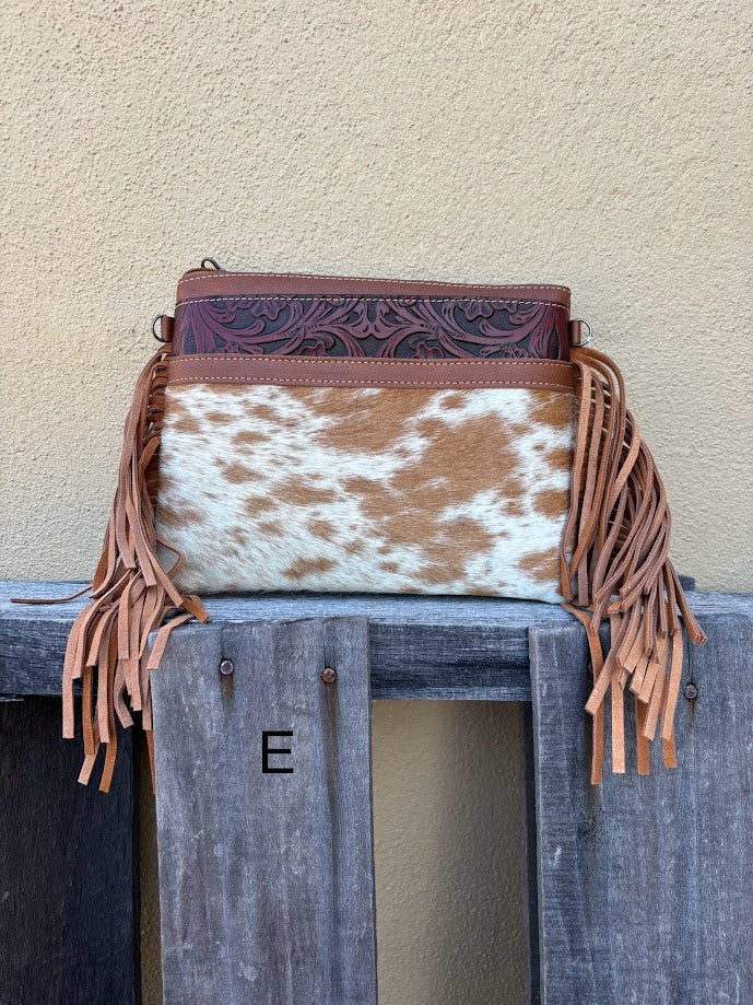 Brown leather and cowhide crossbody bag with side fringe. Front View E