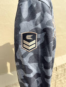 Colosseum Athletics Slate Heather Camo University of Mississippi crewneck sweatshirt with a Rebels Hotty Toddy Ole Miss applique embroidery. Close up of sleeve showing patch.