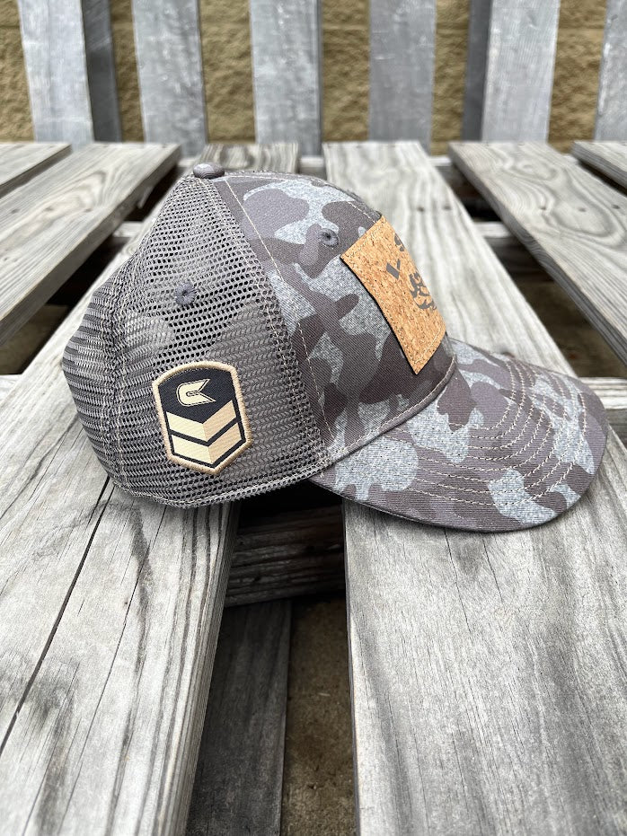 Colosseum Athletics Heather Camo snapback cap with a Louisiana State University "LSU" logo with a Tiger eye cork patch on the front. Side view