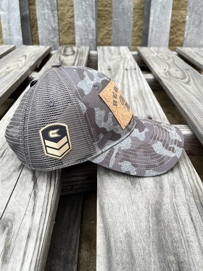 Colosseum Athletics Heather Camo snapback cap with a University  of Mississippi "Ole Miss" Rebels logo cork patch on the front.  Side View