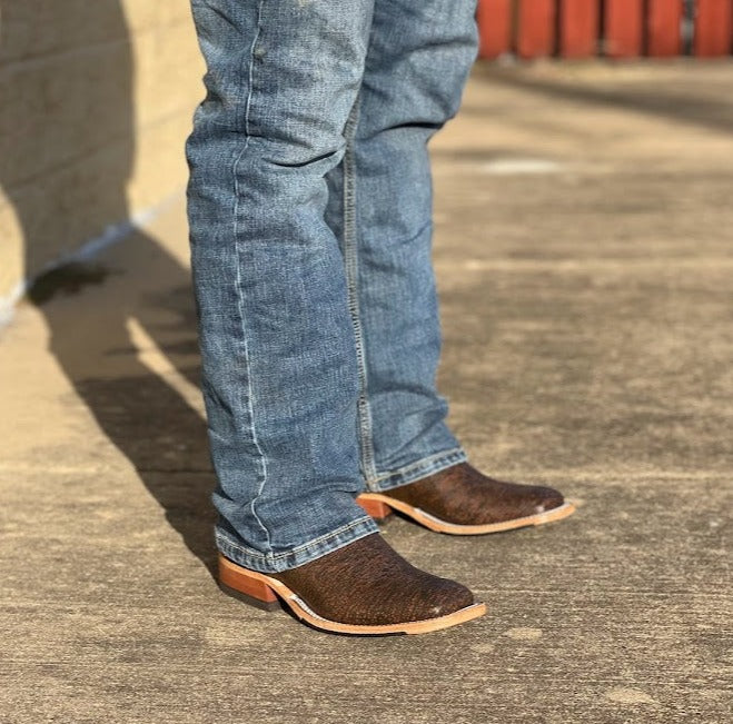 Men's Anderson Bean cowboy boots in cognac Cape Safari Buffalo, these boots have a square toe. Lifestyle view