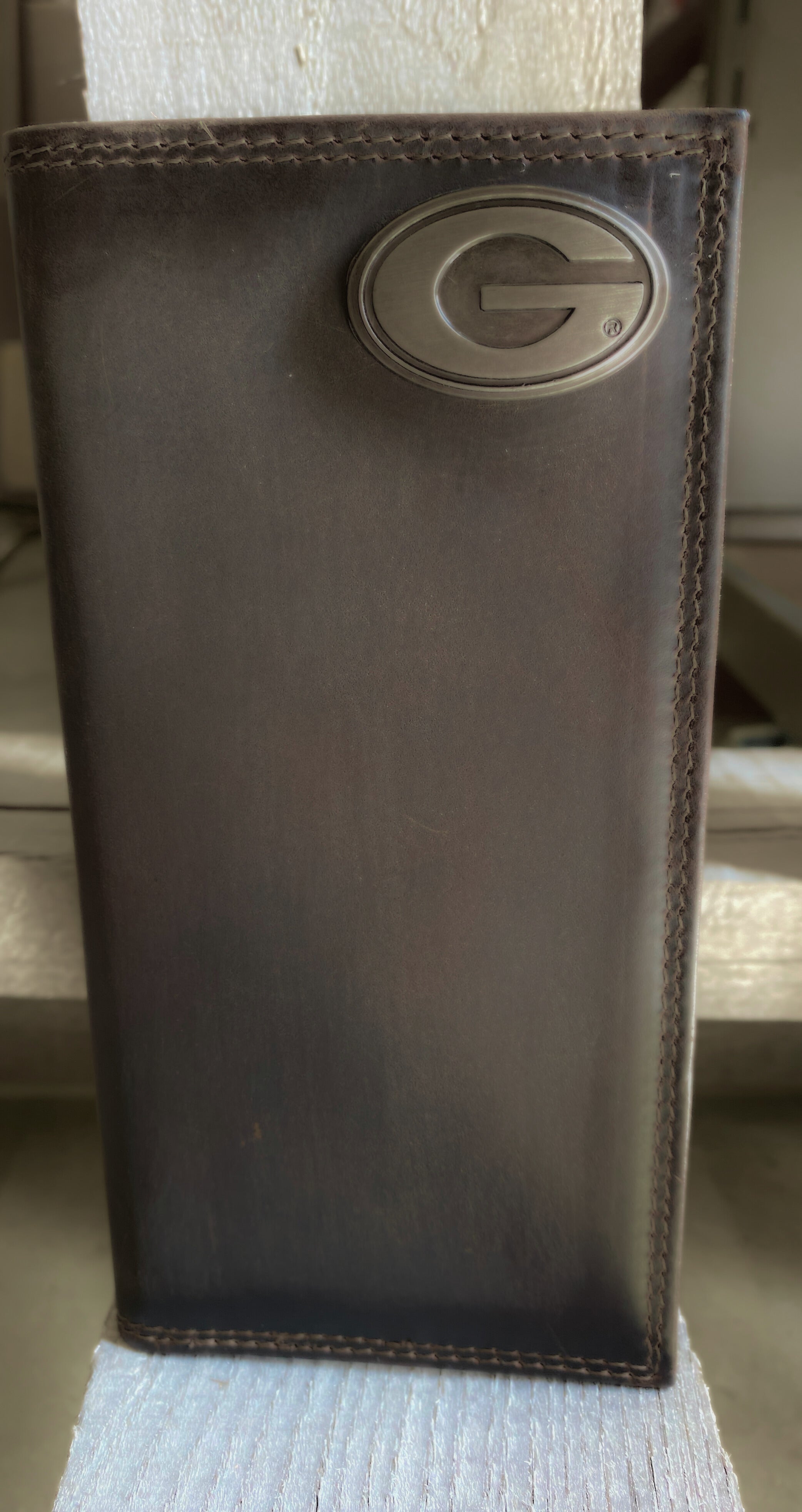 Zep-Pro University of Georgia Bulldogs Brown “Crazy Horse” Leather Tall Wallet with brass "G" Georgia concho in upper right corner. Front view. 