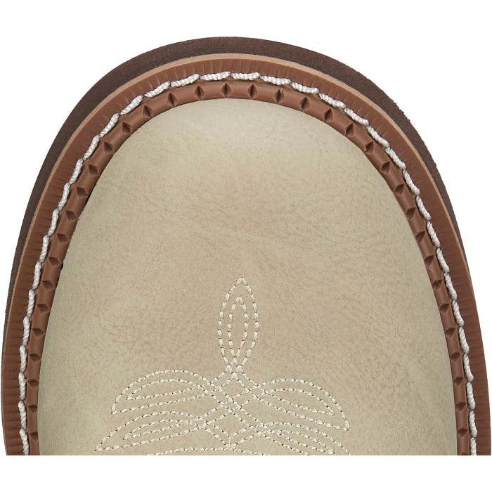 A toe view of a beige Justin Brand cowboy boot with brown accents on a white background.