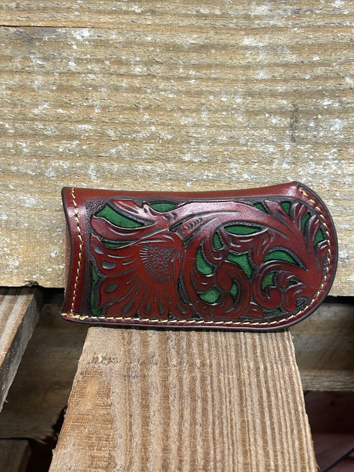 Coffee Brown tooled leather knife sheath with a Green inlay. Front View