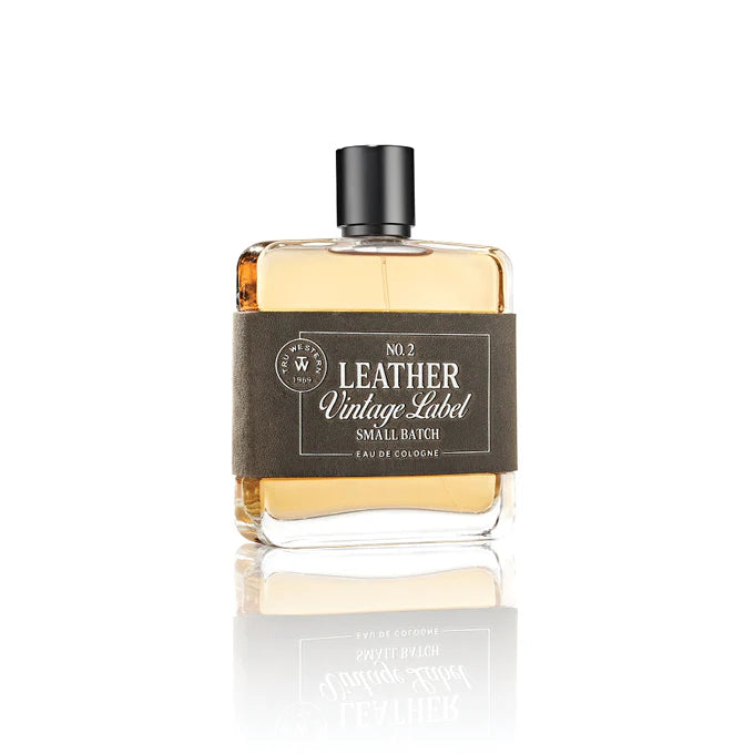 Cologne bottle labeled 'No. 2 Leather Vintage Label' on a white background