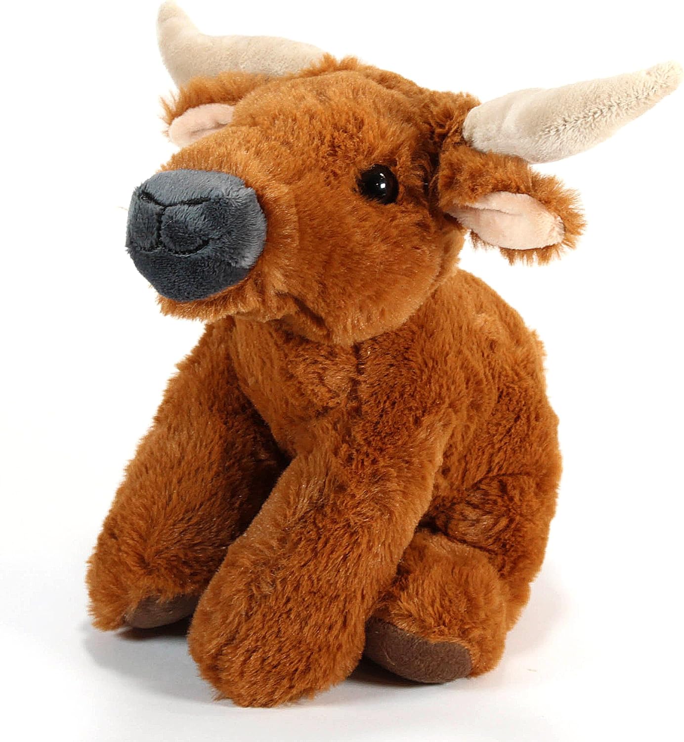 Plush toy seated longhorn cow with off white horns, beige ear lining, a gray smiling muzzle, and a light tan tail tassle. Angled side view.