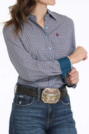 Full front view of women's blue and fuschia printed Cinch shirt showing spread collar, light blue buttons, left chest small open pocket with fuschia embroidered logo, tailored fit details, contrast cuff and collar lining. 