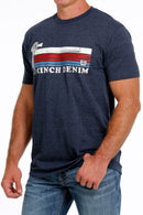 Men's navy Cinch crew neck tee with screen print stripe logo on chest. Front left view.