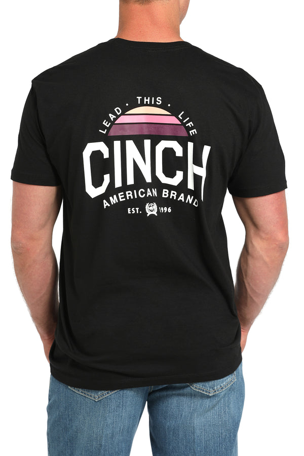 Men's Cinch black crew neck tee with large screen print logo on upper back. 