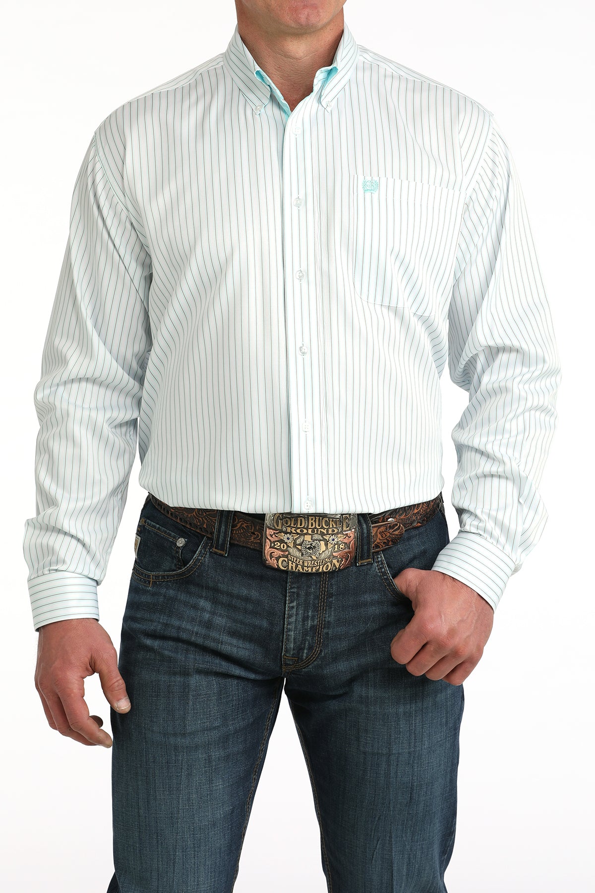 Man wearing a white striped shirt and blue jeans with a decorative belt buckle on a white background
