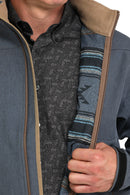 Unzipped front view of Cinch blue bonded jacket that has blue and black aztec striped lining and tan soft velour standing collar lining. Full front zipper shown with blue and tan lining.