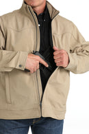 Cinch khaki conceal carry jacket showing inside conceal carry pocket.