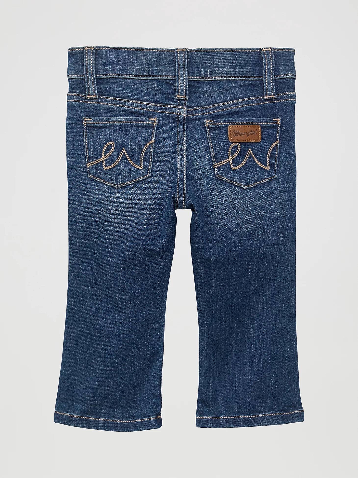Baby girl Wrangler blue jeans with a brand logo on the back pocket. Back view.