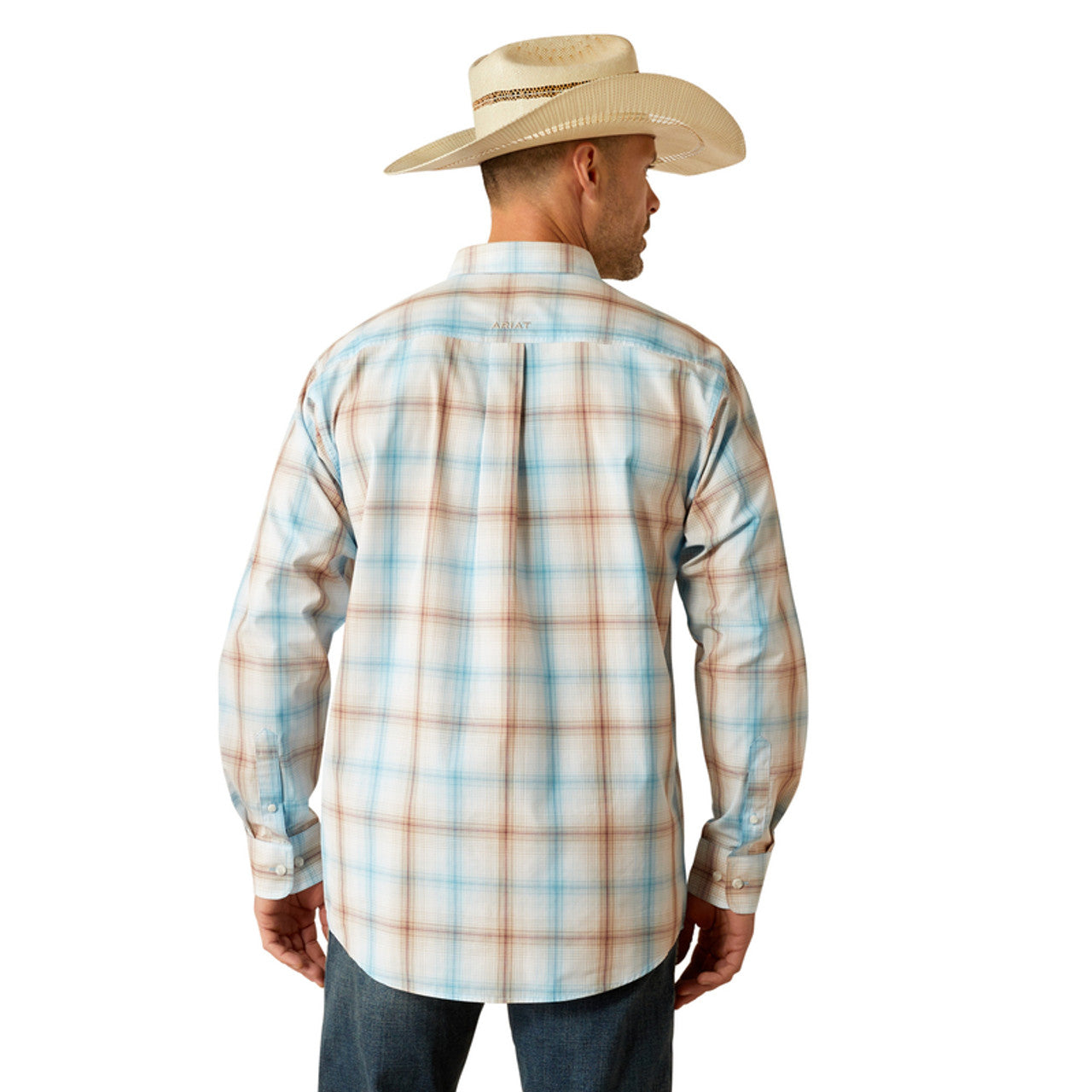 Men's Ariat long sleeve Western style shirt in Light Brown Plaid. Rear view showing shirt untucked and Ariat logo. 