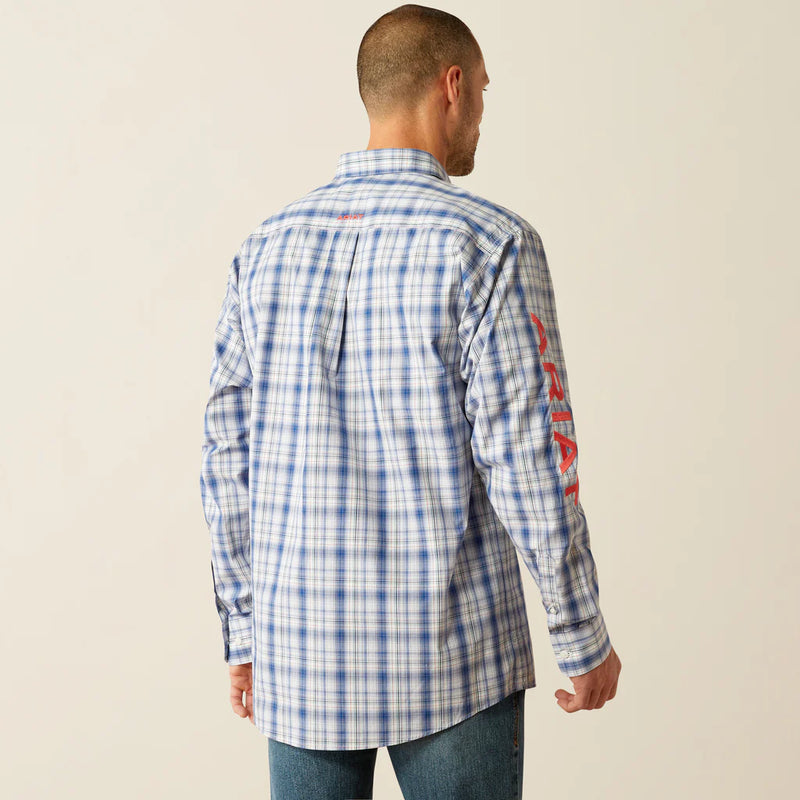 Men's Ariat Pro Series long sleeve shirt in Navy Red Plaid. Rear view showing shirt untucked and blocked Arait logo on yoke and on right sleeve. 