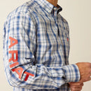 Men's Ariat Pro Series long sleeve shirt in Navy Red Plaid. Close up of right sleeve showing bold Ariat logo. 