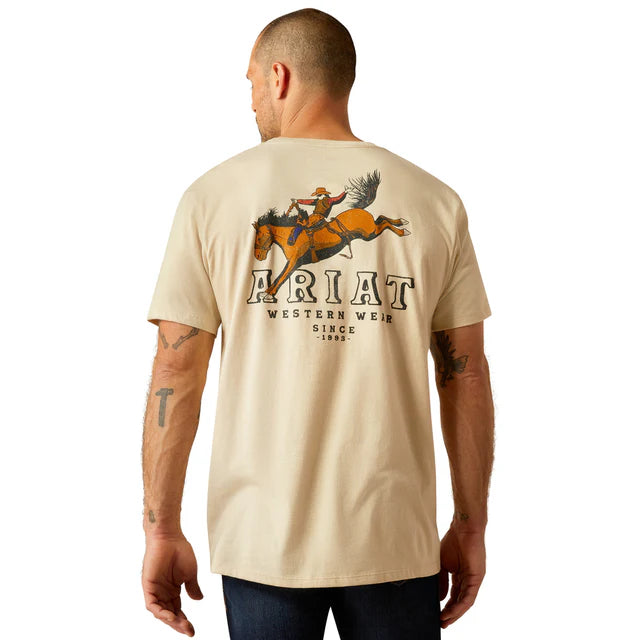 Men's Ariat short sleeve graphic tee in Natural. Rear view showing Bronc rider with Ariat logo. 