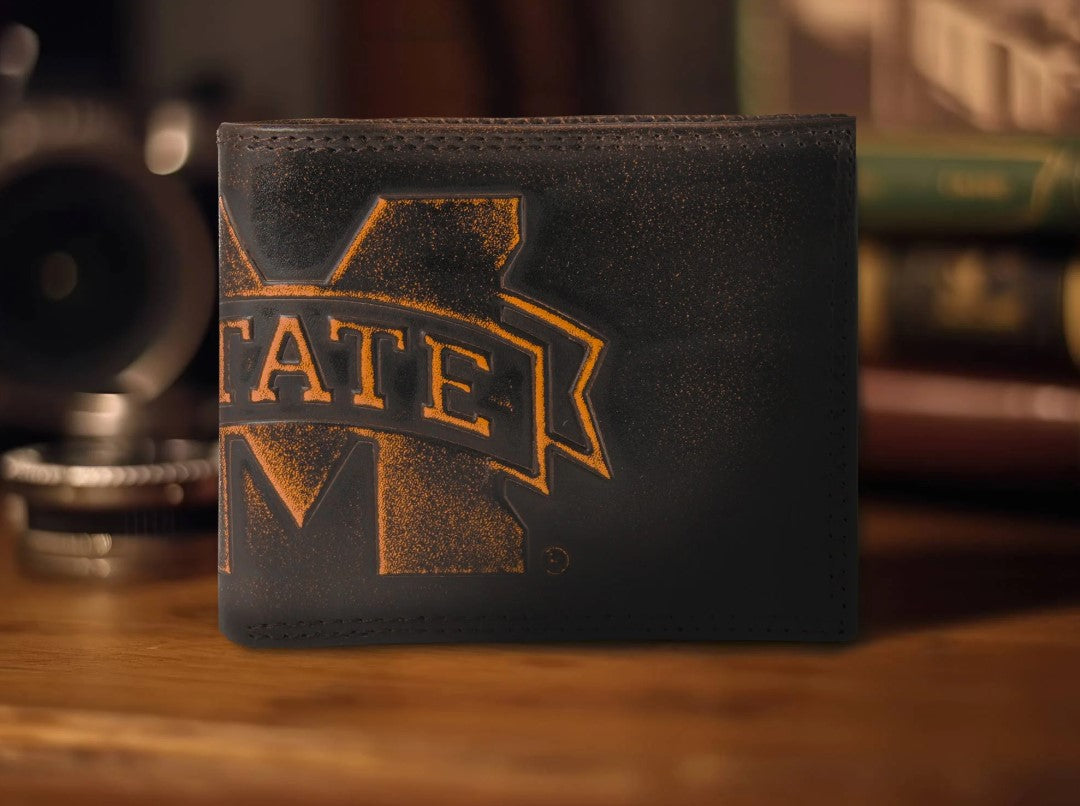 Zep Pro Mississippi State University Bulldogs Burnished Antique Brown Leather Bi-fold Wallet. Front view features "M State" logo across spine of wallet.