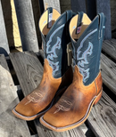 A pair of men's Anderson Bean 11 inch shaft distressed bison cowboy boots with blue kidskin tops and square toes.  Side view