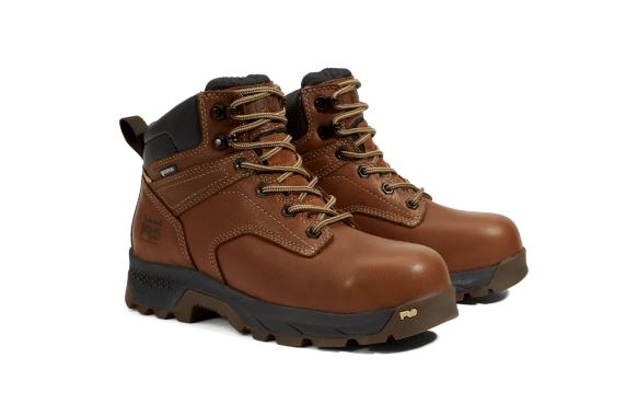 Women's Timberland Brown 6 inch Titan® EV Comp Toe WP Lace-up Boot Angled side view of a pair.