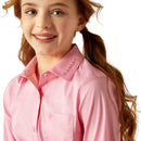 Girls Ariat long sleeve shirt in Prism Pink. This shirt has a bold Ariat logo on left sleeve. Front view showing Ariat logo on collar and chest pocket. 
