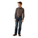 Boy's Ariat long sleeve team logo shirt in brown with a blue diamond pattern. Full front view showing shirt tucked in.