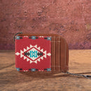 A mini zip card case with a southwestern art print, featuring a geometric pattern in red, white, and blue, combined with a brown canvas body and PU leather accents.