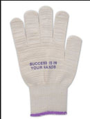 Palm of the glove photo showing the 'Success is in Your Hands' and wrist border in purple to indicate size extra large.