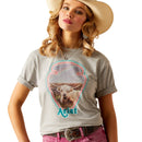 Women's Ariat Boyfriend fit Arrowhead graphic print T-Shirt in Heather Grey. This relaxed fit shirt features a graphic print on the front of a cow in the shape of an arrowhead with the Ariat logo. Front view showing shirt tucked in. 