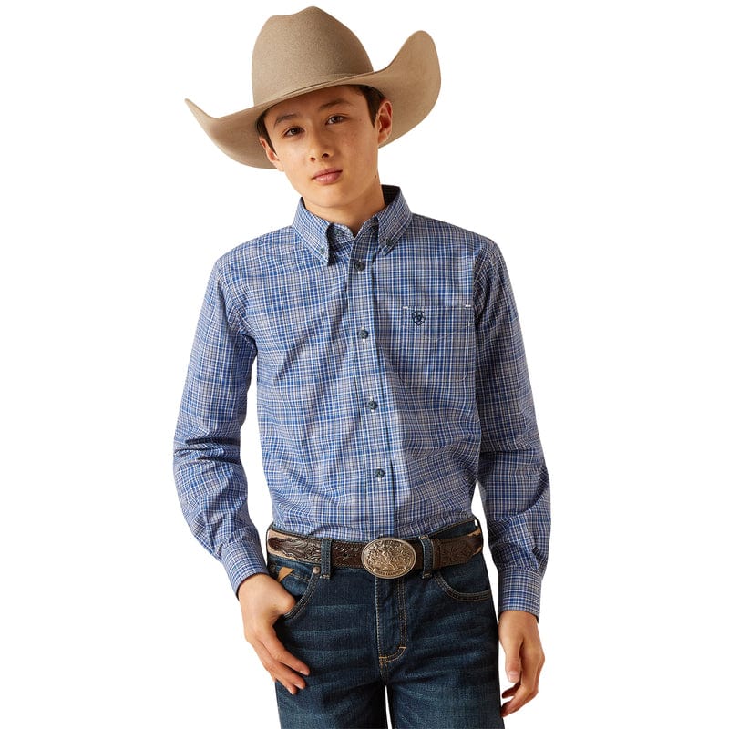 Boy's Ariat long sleeve shirt in True Blue Plaid.  Front view showing shirt tucked in. 