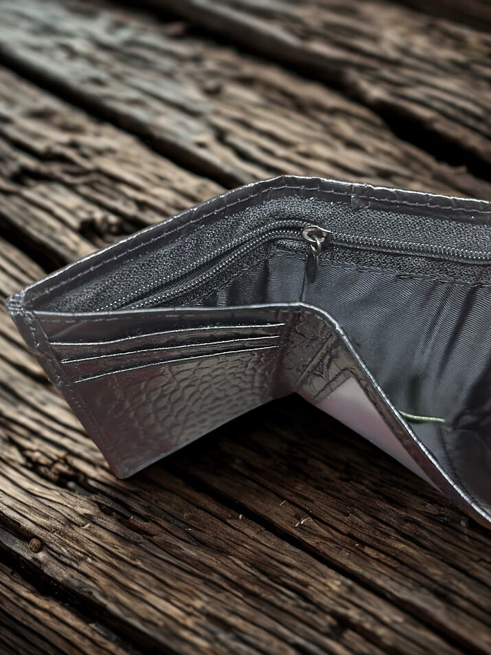 Black Alligator print leather trifold wallet with cowhide inlay and a Praying Cowboy Concho. Inside view showing cash slot and zippered pocket.