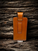 Light Brown leather phone case with a embossed Praying Cowboy design. Rear view showing belt loop. 