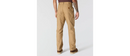 Men's Carhartt Dark Khaki canvas work dungaree pants with multiple utility pockets. Rear View
