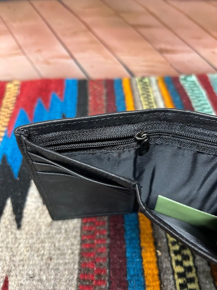 This Black leather trifold wallet from Top Notch accessories features nine card slots, a ID window, and two cash slots one zips close. Close up view of bill slots showing zip close. 
