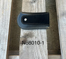This Black leather knife sheath from Top Notch Accessories features an embossed Praying Cowboy design. Rear view showing leather belt attachment. 