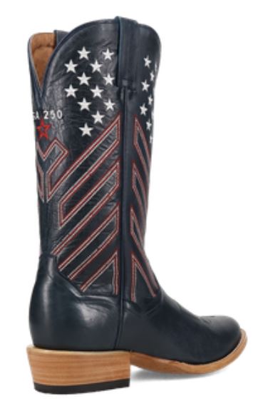Men's Dan Post America 250 boot in navy blue with red and white stitching resembling flag stripes that are angled up and embroidered small white stars near the top of the shaft on front and back (12 on either side of front and back scallops). At shaft scallop embroidered "USA 250" above an outlined red star.  Top of boot has a total of 50 stars. Angled instep back view of left boot.