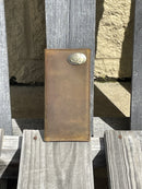 Zep Pro Cotton Boll Concho Vintage Tan Leather Tall Wallet is constructed of full grain leather with a vintage tan finish and features the Cotton Boll metal logo, proudly displayed on the front upper right corner. Front view