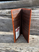 Brown Basketweave leather tall wallet with a Praying Cowboy Concho on a cowhide inlay. Inside view showing multiple card slots and ID window. 